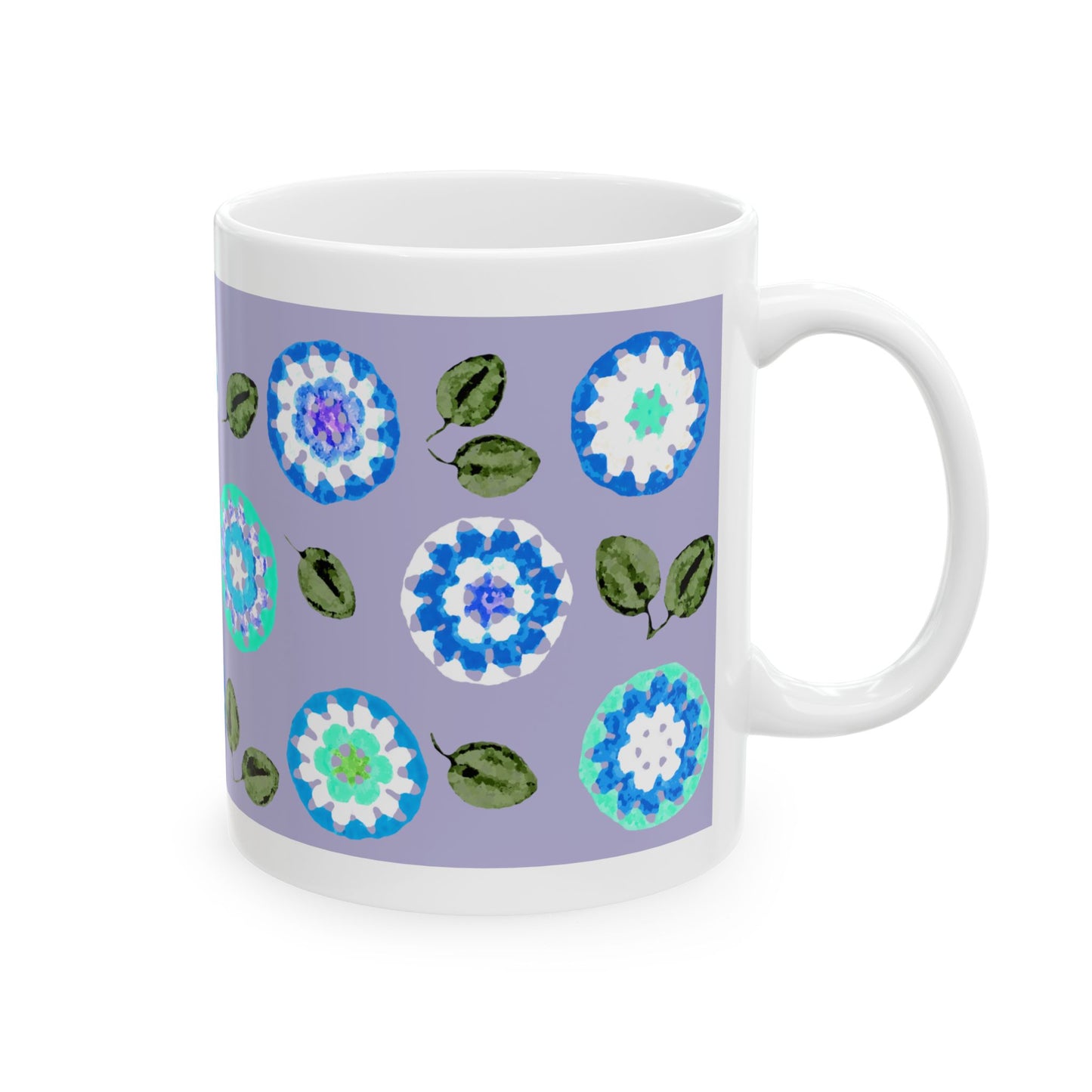 White mug with floral pattern on a purple background